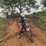 Family dirt bike adventure on an off-road trail in Lombok