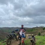 Family enjoying a Lombok dirt bike tour with scenic views.